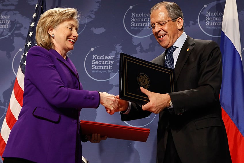 WASHINGTON - APRIL 13: U.S. Secretary of State Hillary Rodham Clinton (L) and Russian Foreign Minister Sergey Lavrov exchange signed copies of an agreement on eliminating excess weapon-grade plutonium from their defense programs during the Nuclear Safety Summit at the Washington Convention Center April 13, 2010 in Washington, DC. Clinton said the irreversable process of desposing of each countries excess weapon-grade plutonium, enough material for several thousand nuclear weapons, will prevent it from falling into the hands of terrorists. (Photo by Chip Somodevilla/Getty Images)