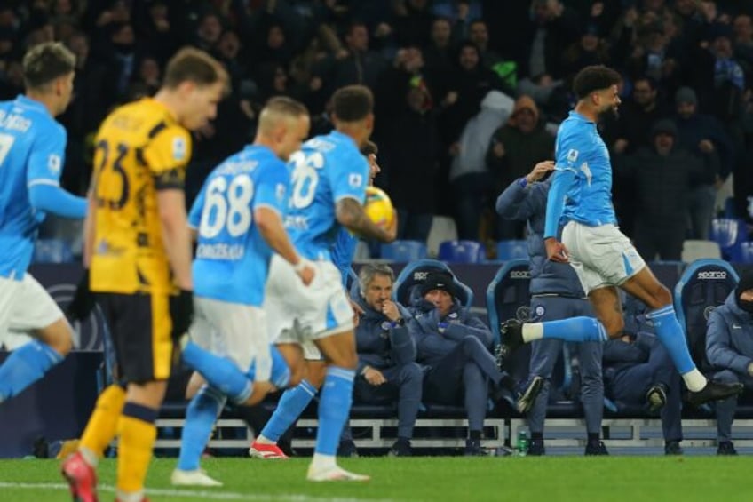 Philip Billing (R) celebrates scoring a late equaliser for Napoli against Inter Milan