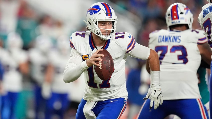 Josh Allen looks to pass