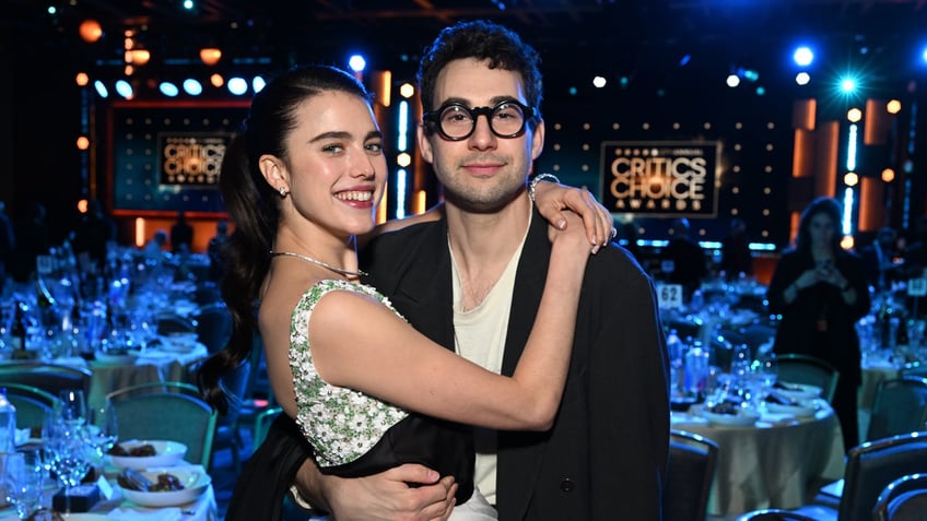 Margaret Qualley and Jack Antonoff hug