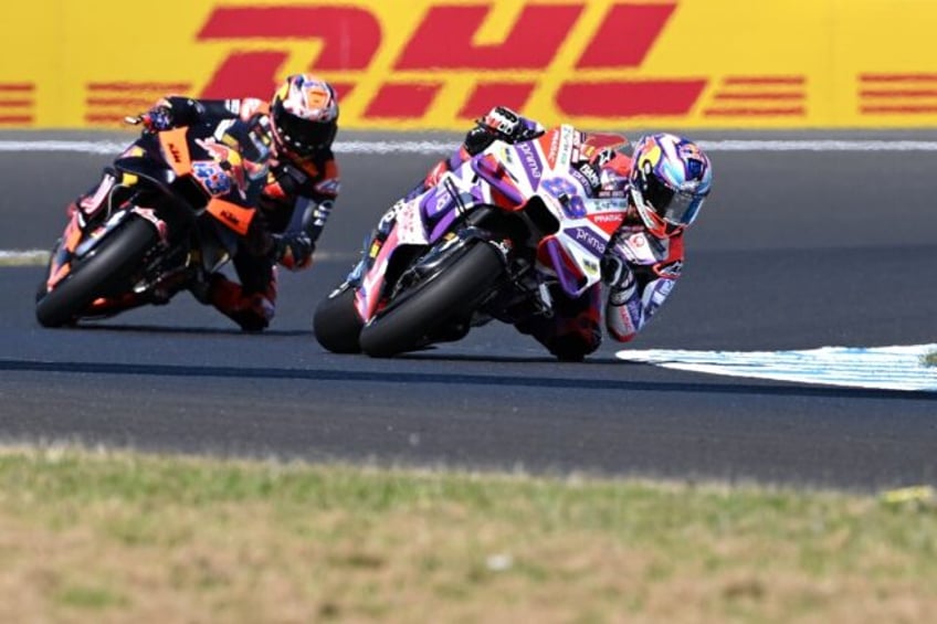 binder takes charge at australia motogp as bagnaia misses top 10