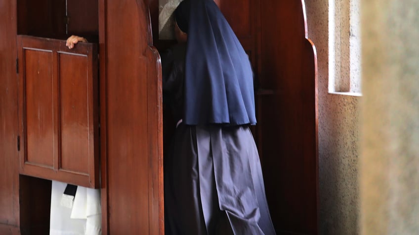 nun takes confession