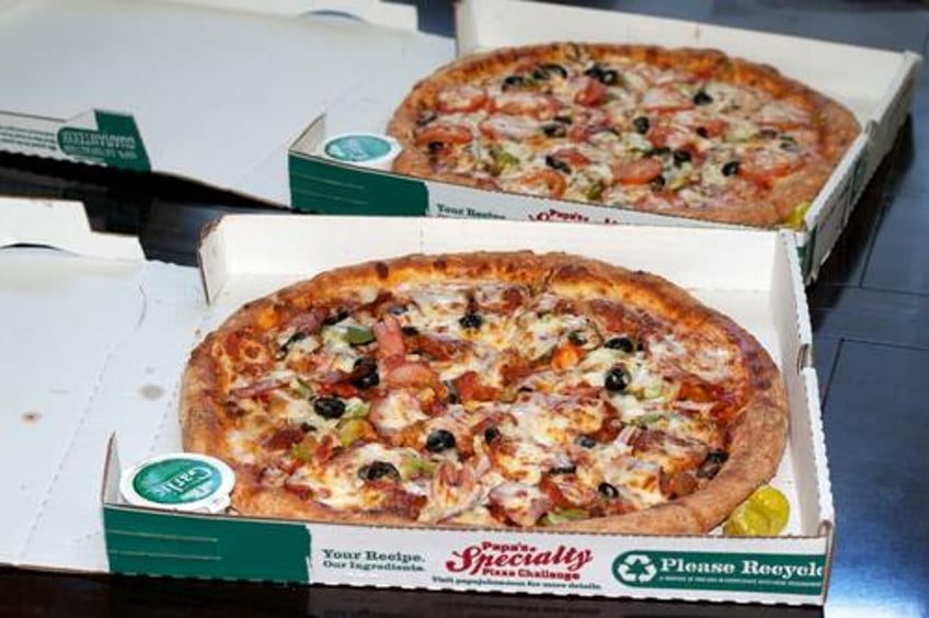 bitcoin hits new record high surpasses amazons market cap on pizza day 