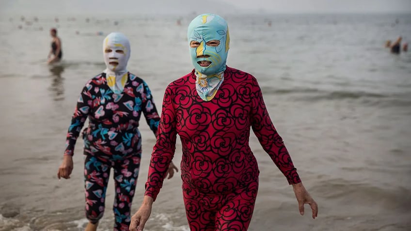 bizarre facekinis fashion craze hits china beaches amid record heat