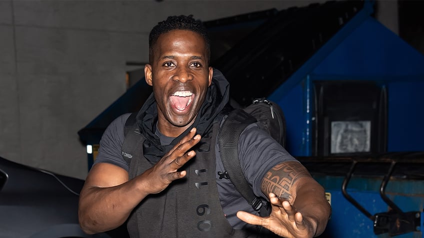 Godfrey poses outside a comedy venue in Philadelphia in Nov. 2020