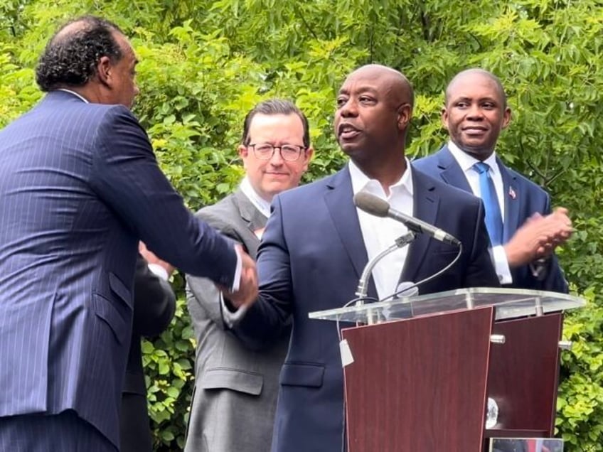 Sen. Tim Scott (R-SC) greets black elected officials at the first-ever black delegates&#03