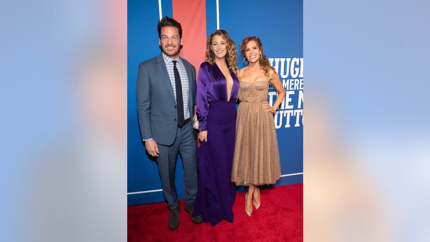 Bart Johnson posing with his wife and Blake Lively