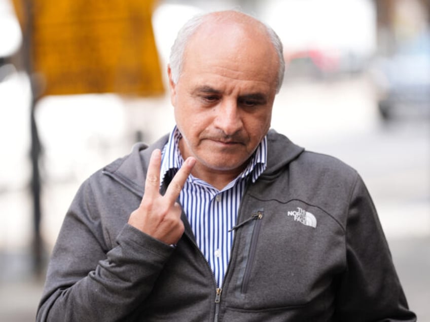 EDITORS NOTE: OFFENSIVE GESTURE Hamit Coskun arrives at Westminster Magistrates' Court, ce