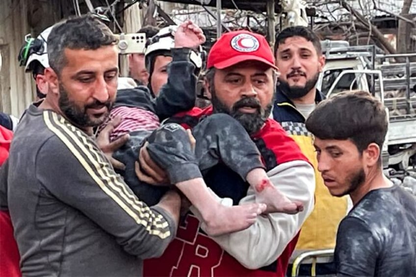 Rescue workers dug out people trapped after a building collapsed in an explosion