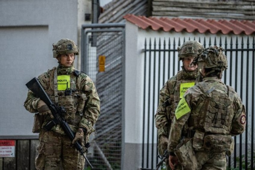 Danish military Police guard the Israeli embassy in Copenhagen after two blasts went off