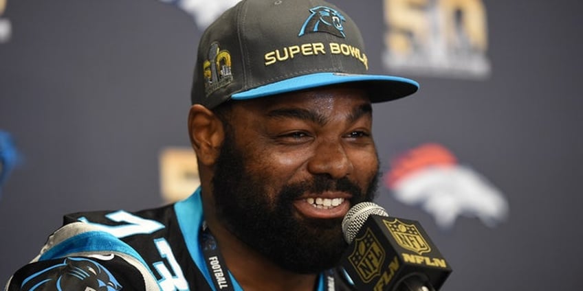 blind side author michael lewis breaks silence on michael oher petition against tuohy family