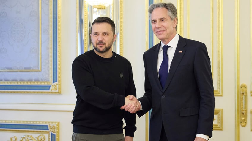 Blinken posing with Zelenskyy in Ukraine