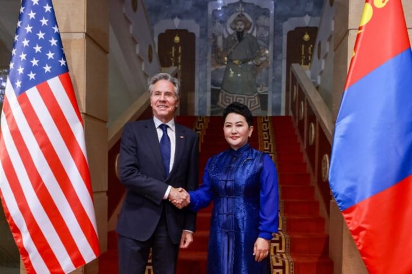 US Secretary of State Antony Blinken (L) meets with Mongolia's Foreign Minister Batmunkh B