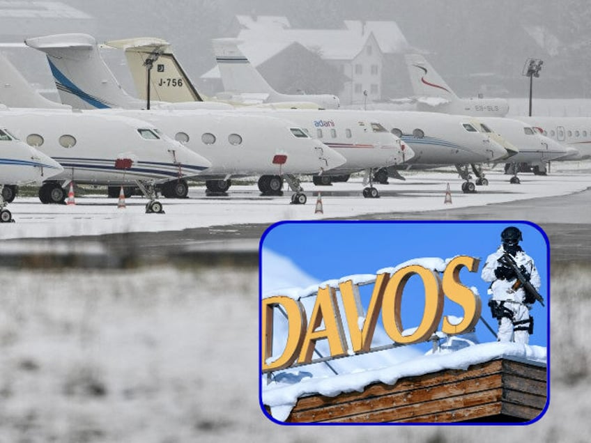 Planes are parked at Dubendorf airport, on January 18, 2023. Environmental lobby group Greenpeace accused attendees of the annual Davos meeting of a "distasteful masterclass in hypocrisy" over their use of private jets to travel to the event in the Swiss Alps. (SEBASTIEN BOZON/AFP via Getty Images)