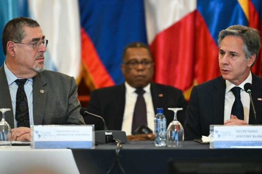 US Secretary of State Antony Blinken (R) speaks next to Guatemala's President Bernardo Are