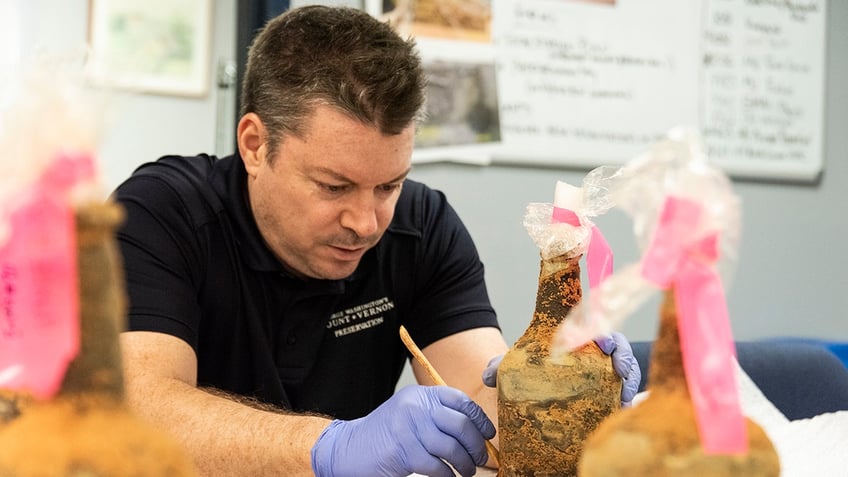 Scientists conserving bottle