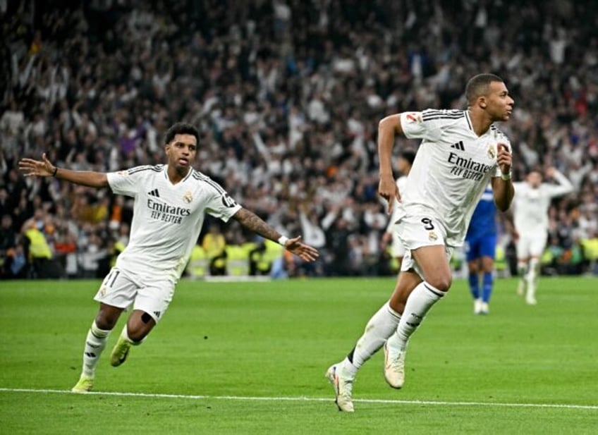 Real Madrid's French forward Kylian Mbappe celebrates scoring his team's second goal