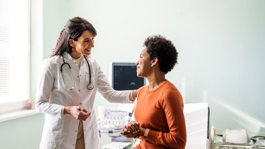 Doctor with patient