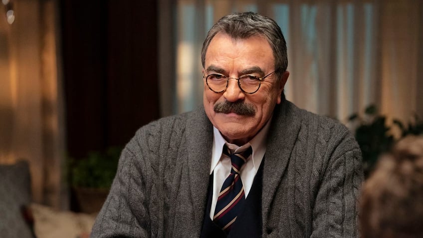 Tom Selleck smiling on the set of Blue Bloods