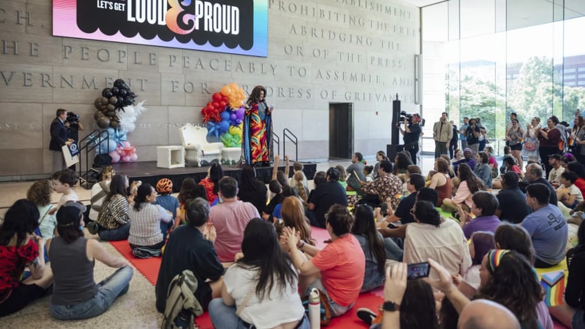 Drag queen reading to room of children