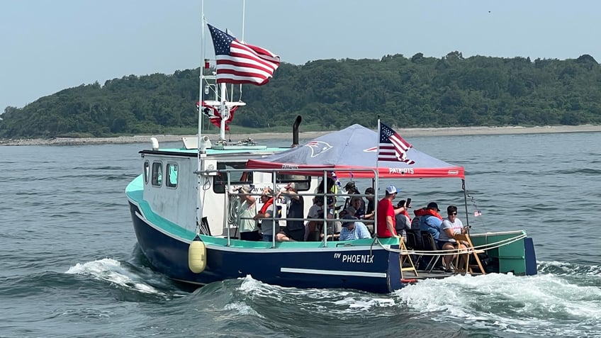 blue collar boaters on boston harbor honor disabled veterans with 65th annual fishing trip