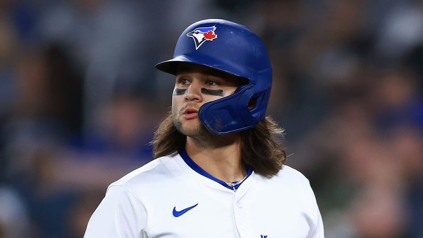 Bo Bichette looks on field