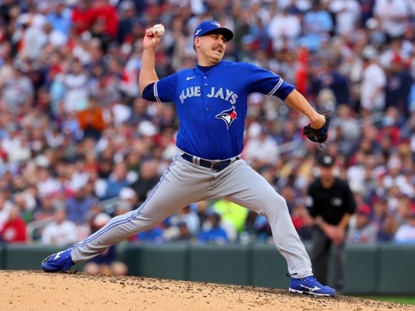 blue jays pitcher stands his ground after being criticized for taking his son goose hunting