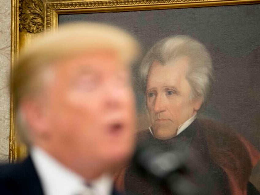 A painting of former President Andrew Jackson is visible behind President Donald Trump as