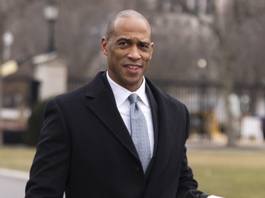 Housing and Urban Development Secretary Scott Turner, walks towards the West Wing followin