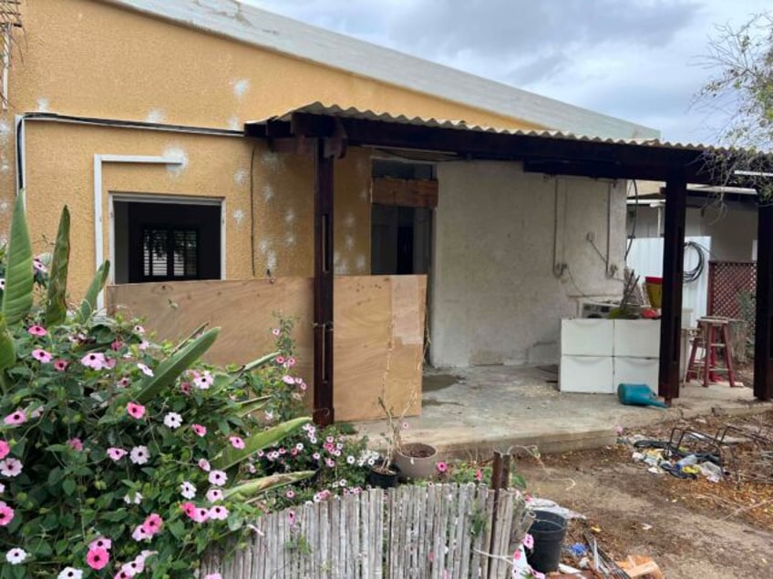 A home with bullet and shrapnel holes is renovated in Kibbutz Nirim, November 24, 2024. (J