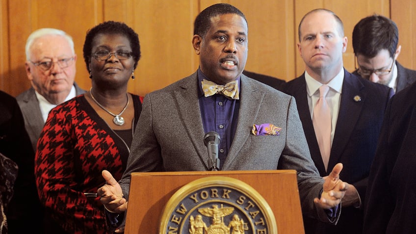 State Sen. Kevin Parker, D-NY, with people behind him