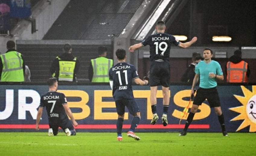 Kevin Stoeger (L) scored one and set up two as Bochum beat Fortuna Duesseldorf on penaltie