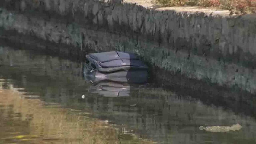 body found stuffed in suitcase floating in california lake gruesome