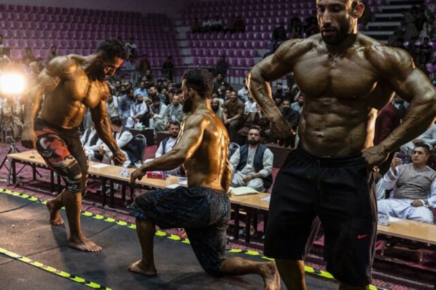 Afghan bodybuilders must wear long shorts during competitions under rules imposed by Talib