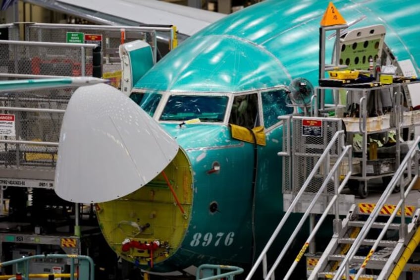 Boeing 737 MAX aircraft are seen in various states of assembly at the company factory in R