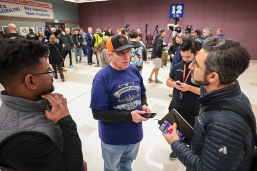 Boeing workers shown just after union leaders announced November 4 that the contract was r