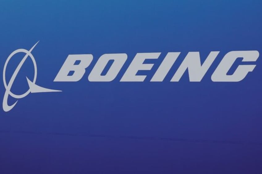 boeing shares rise despite q2 loss as it boosts plane production