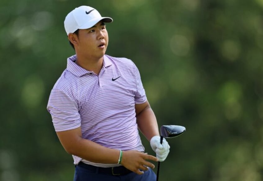 South Korea's Tom Kim fired a bogey-free five-under par 65 to seize the lead after the sec