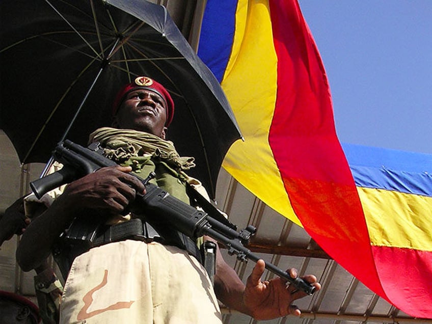 A soldier stands guard as Chadian President Idriss Deby Itno (not pictured) denounces the