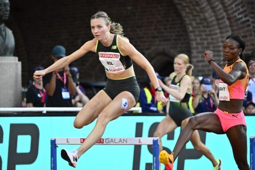 The Netherlands' Femke Bol (L) and Jamaica's Andrenette Knight (R)