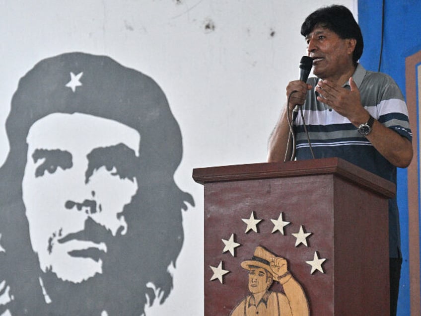 Former Bolivian President Evo Morales gestures as he speaks during the presentation of his
