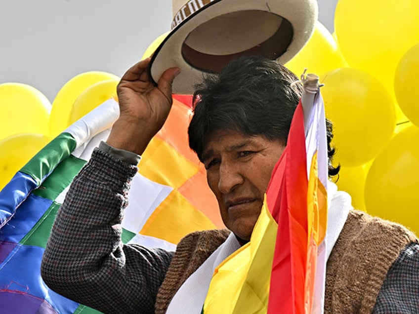 Bolivian former President (2006-2019) Evo Morales Ayma puts a hat on before the start of t