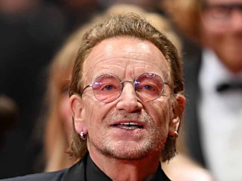 CANNES, FRANCE - MAY 16: Irish singer-Songwriter and executive producer Bono arrives for t