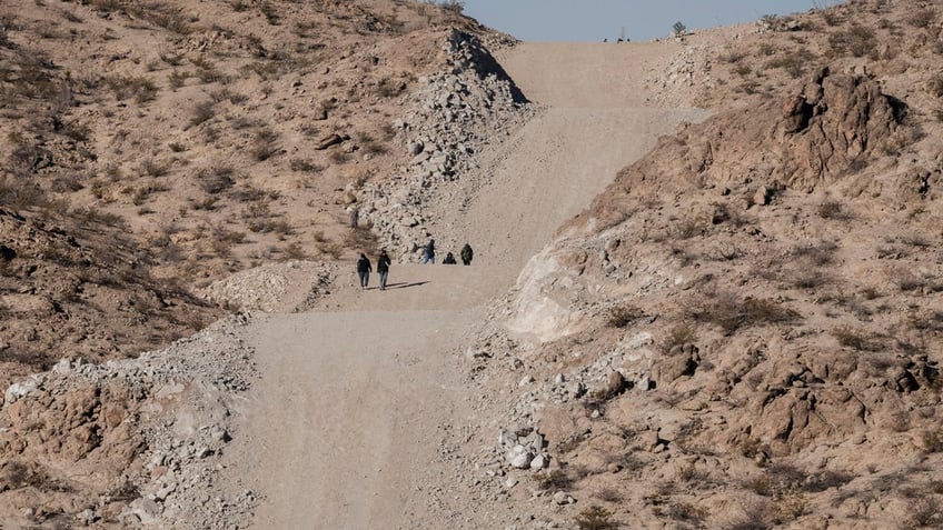 People crossing border