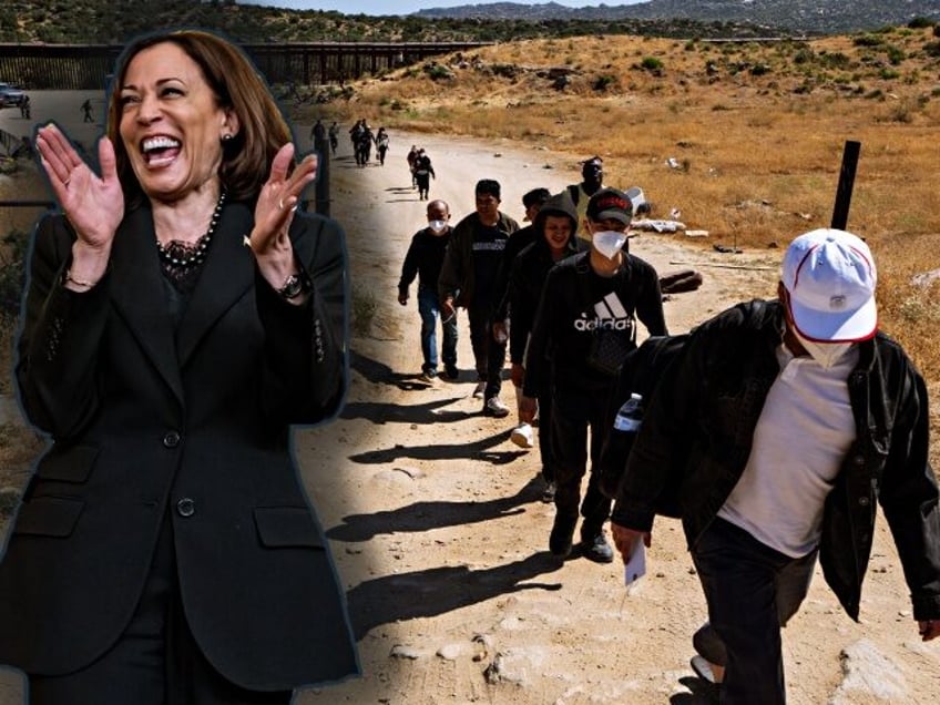 SAN DIEGO, CA - JUNE 13: Migrants walk on a road waiting to be processed by the U.S. Borde