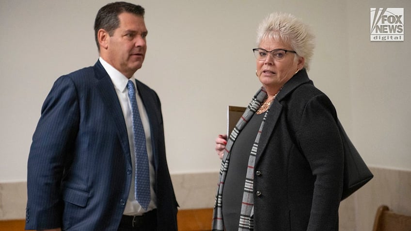 Joseph Cataldo and Rosemary Scapicchio, attorneies for Matthew Nilo, depart the Suffolk County Superior Courthouse