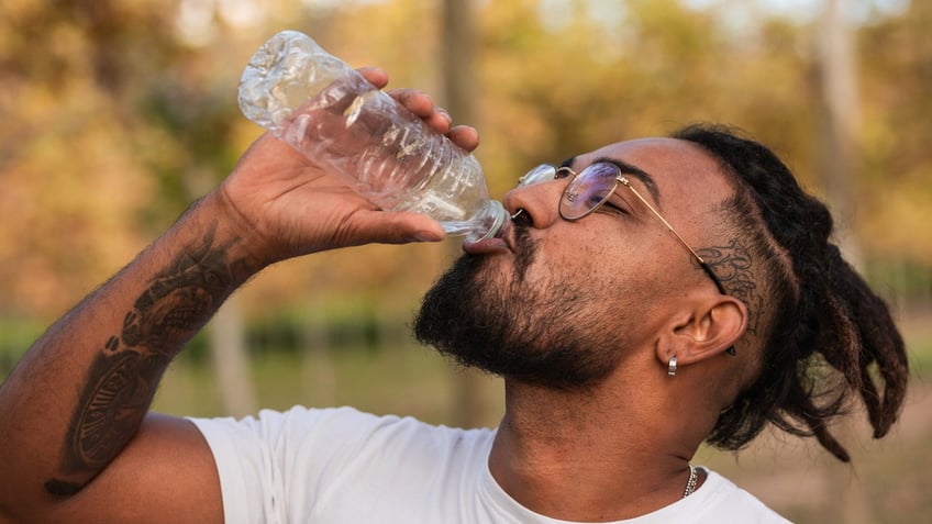 Man with bottled water