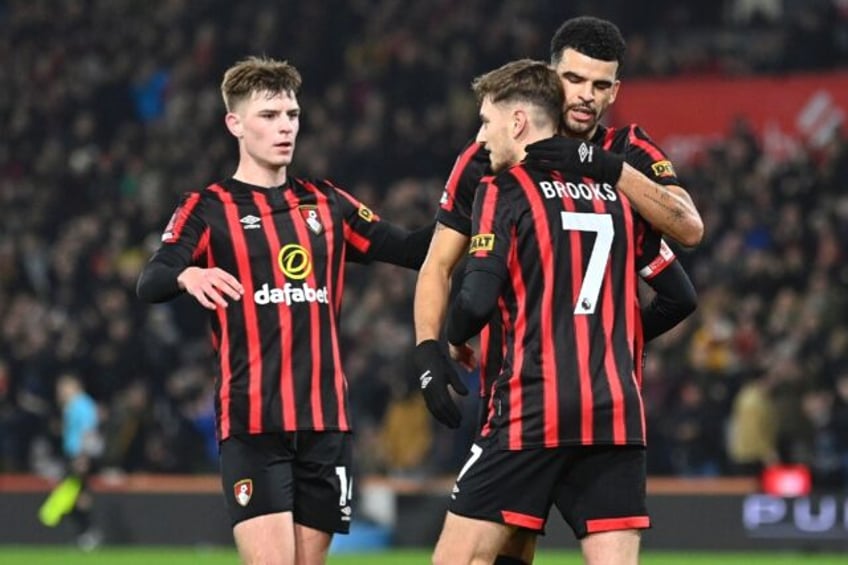 Bournemouth celebrate during their FA Cup win over Swansea