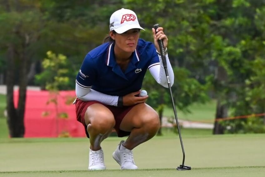 Celine Boutier of France lines up a shot during round two in Singapore