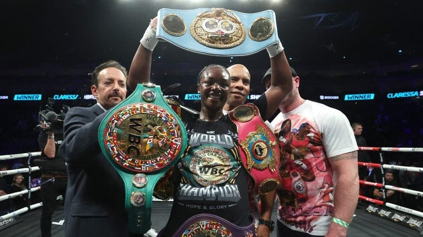 LONDON, ENGLAND - OCTOBER 15: Claressa Shields celebrates after defeating Savannah Marshall, during their undisputed middleweight championship fight at The 02 Arena on October 15, 2022 in London, England. (Photo by Mark Robinson/Top Rank Inc via Getty Images)